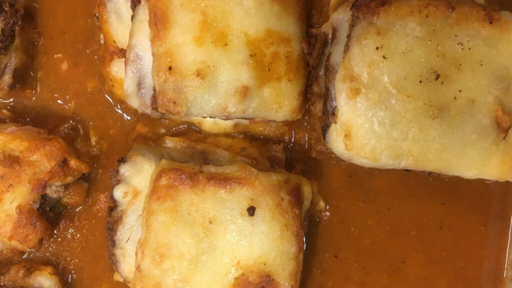 lasanha de presunto e queijo ao molho